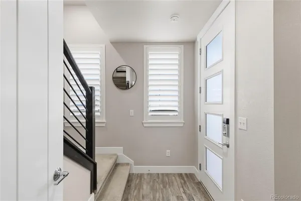 a view of a hallway with windows