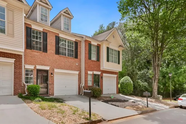 a front view of a house with street