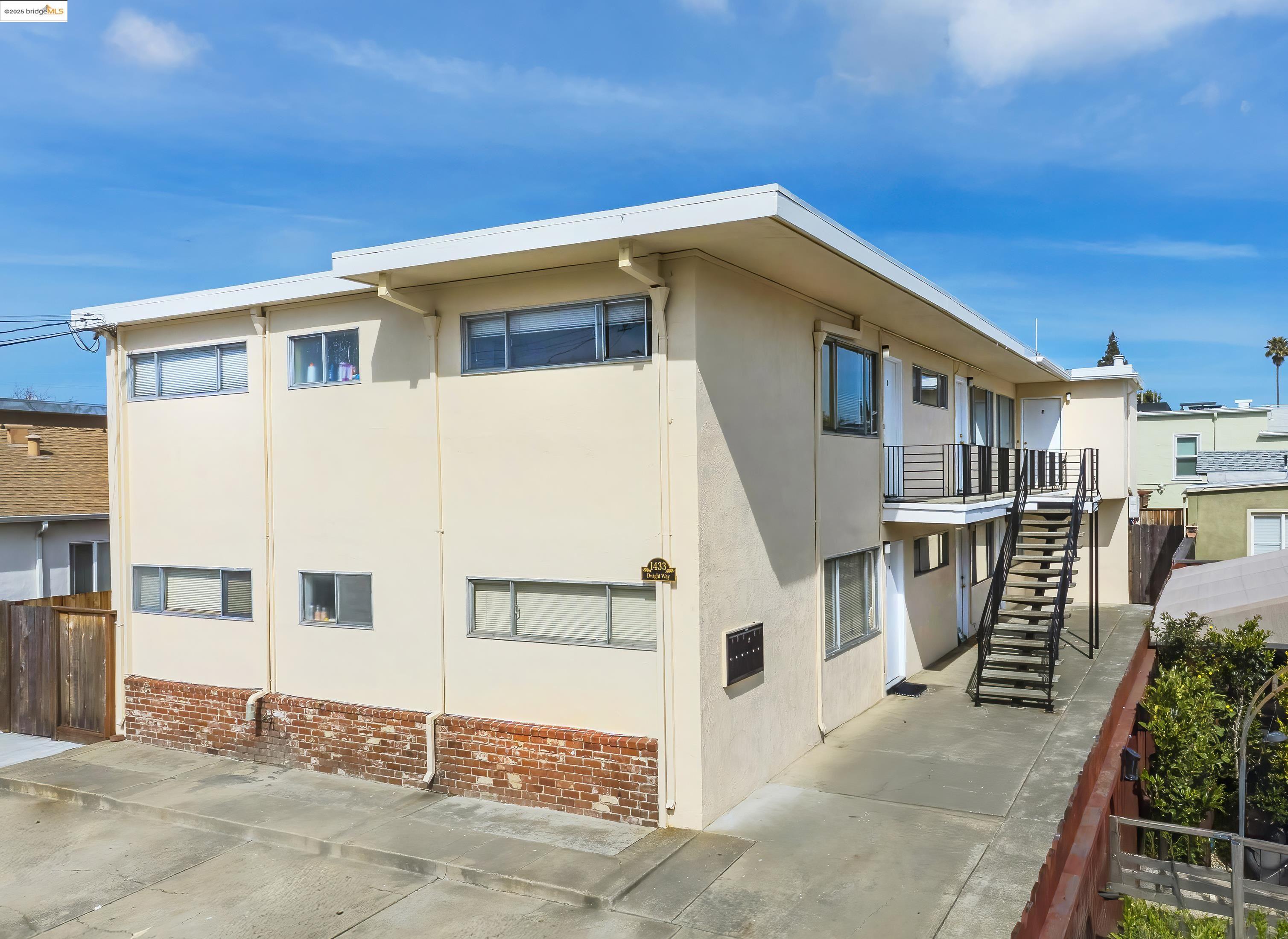 1433 Dwight Way Berkeley, CA 94702 - Photo 1 of 26 a front view of a house with a garage
