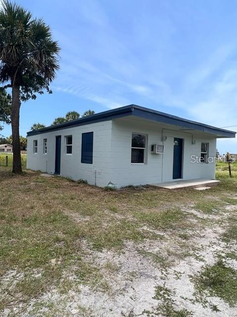 2513 Lipscomb Street Melbourne, FL 32901 - Photo 3 of 4 a view of a house with a backyard