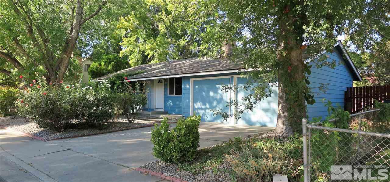 1825 Hawthorne Road Reno, NV 89502 - Photo 2 of 21 a front view of a house with garden