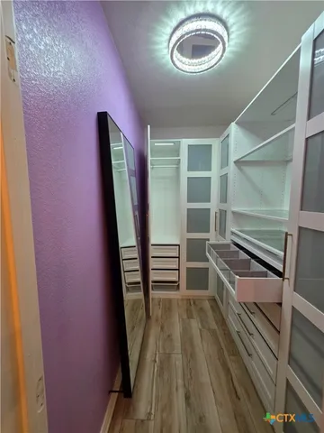 a view of entryway with wooden floor