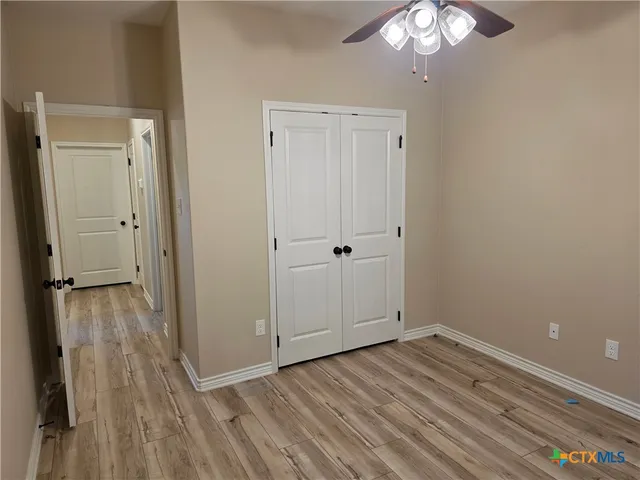 wooden floor and an entryway in a room
