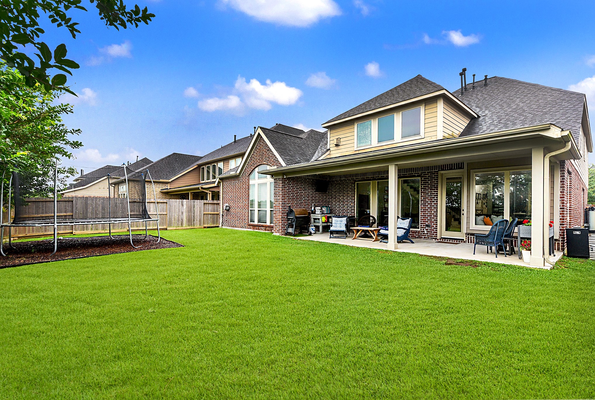2939 Bobby Jones Road Katy, TX 77494 - Photo 44 of 50 a view of a house with a yard porch and sitting area