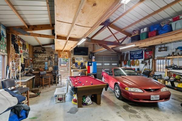 7766 North State Highway 78 Ravenna, TX 75476 - Photo 27 of 39 Garage featuring a workshop area