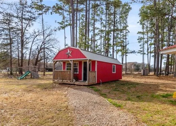 a view of a park with large trees
