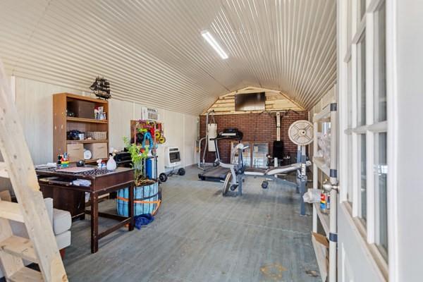 7766 North State Highway 78 Ravenna, TX 75476 - Photo 34 of 39 Exercise room with lofted ceiling and heating unit