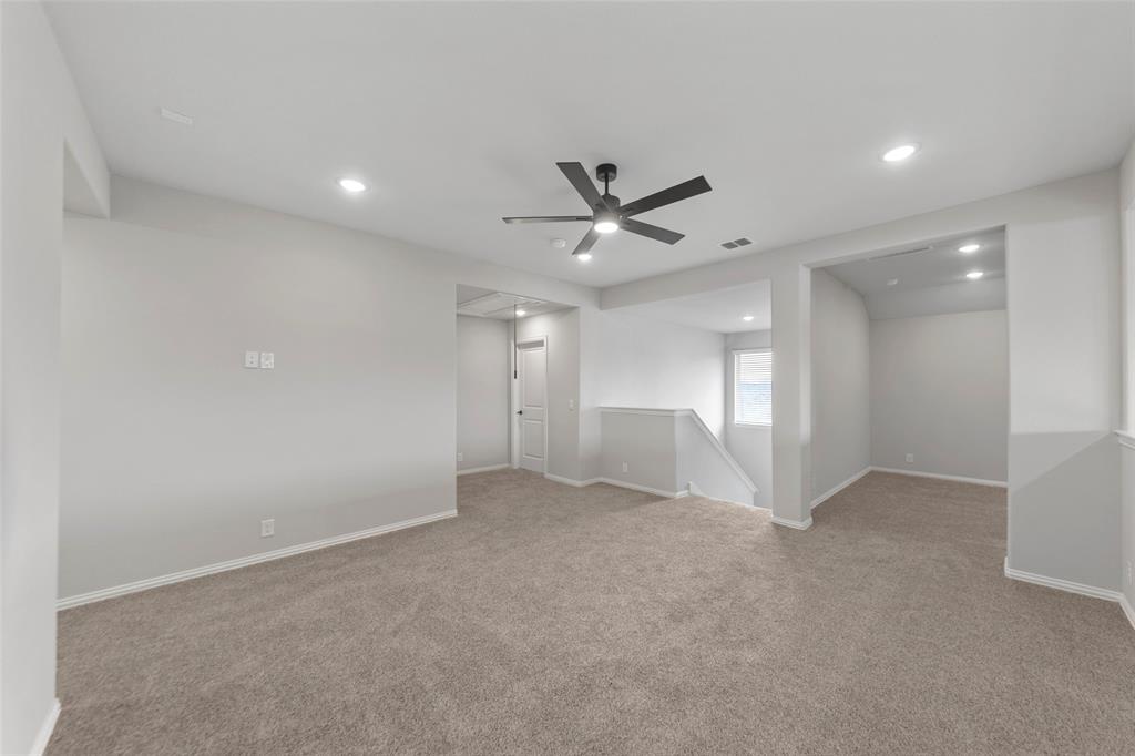 3405 Heathrow Road Mesquite, TX 75181 - Photo 16 of 30 an empty room with a empty space and a ceiling fan