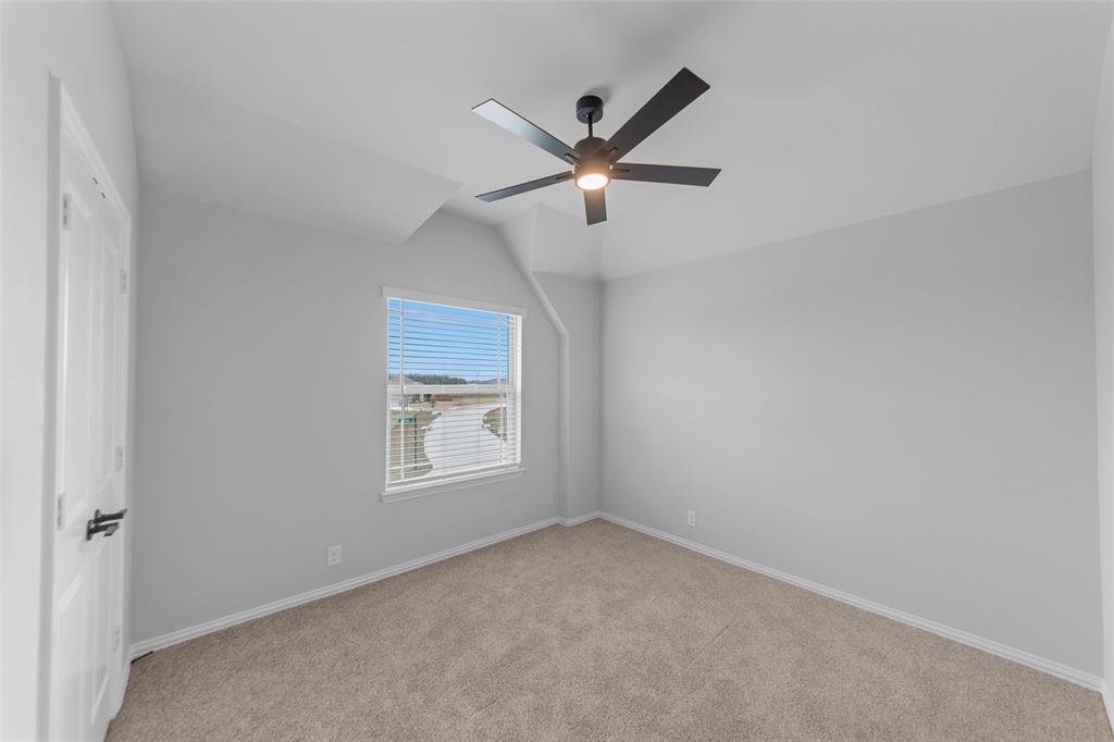 3405 Heathrow Road Mesquite, TX 75181 - Photo 22 of 30 a view of a big room with wooden floor and windows