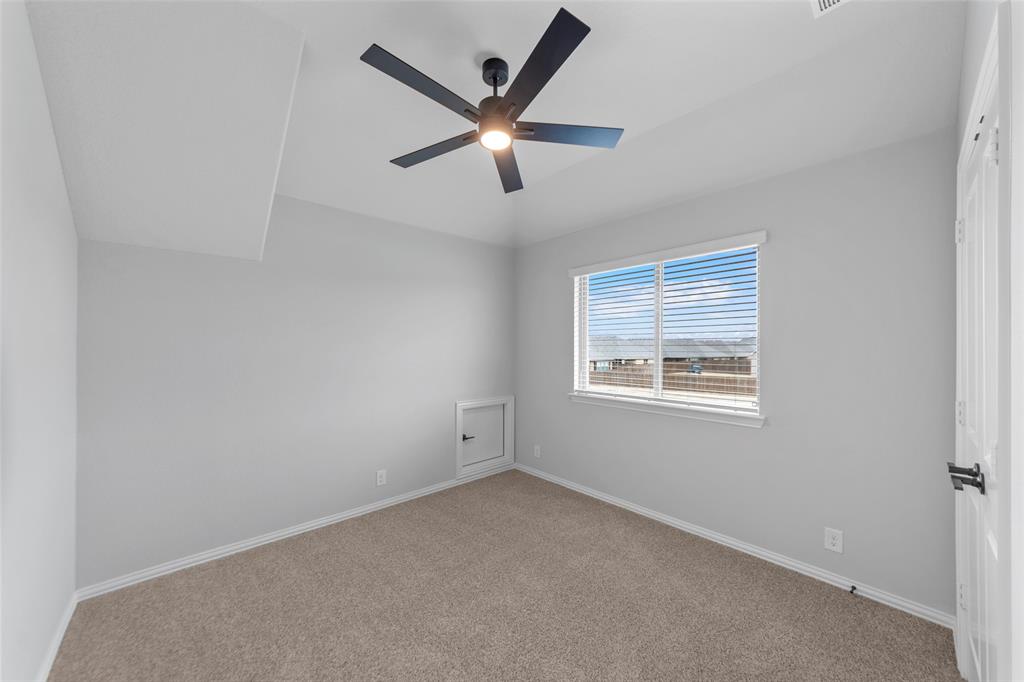 3405 Heathrow Road Mesquite, TX 75181 - Photo 23 of 30 a view of an empty room with a window
