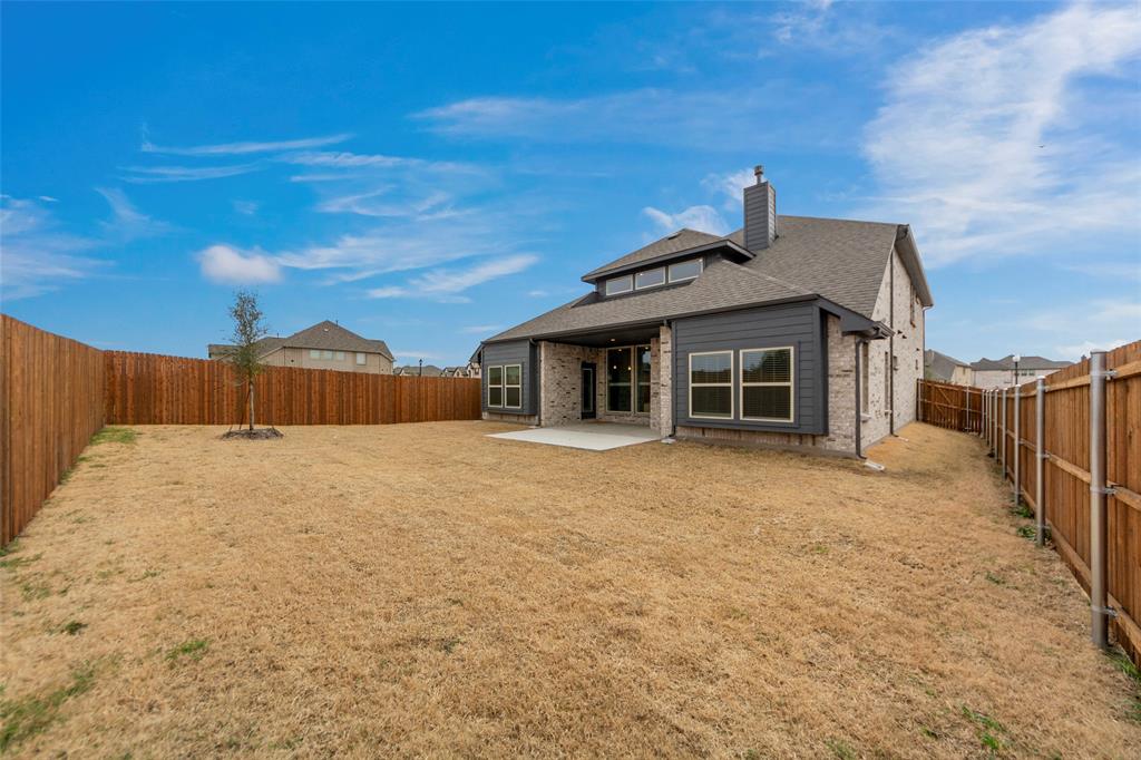 3405 Heathrow Road Mesquite, TX 75181 - Photo 29 of 30 a front view of house with yard