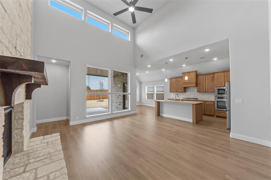 3405 Heathrow Road Mesquite, TX 75181 - Photo 3 of 30 a view of kitchen with granite countertop counter top space a sink appliances and cabinets