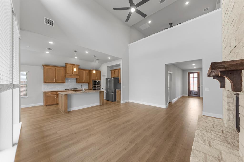 3405 Heathrow Road Mesquite, TX 75181 - Photo 4 of 30 a view of kitchen with refrigerator and window