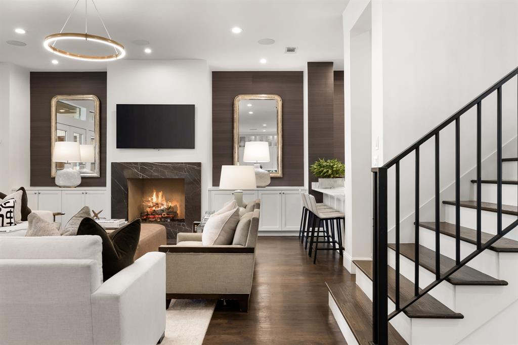 4635 West Amherst Avenue Dallas, TX 75209 - Photo 13 of 36 a living room with furniture and a fireplace