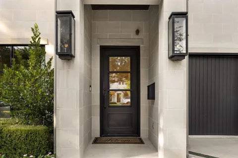 a view of living room with furniture and window