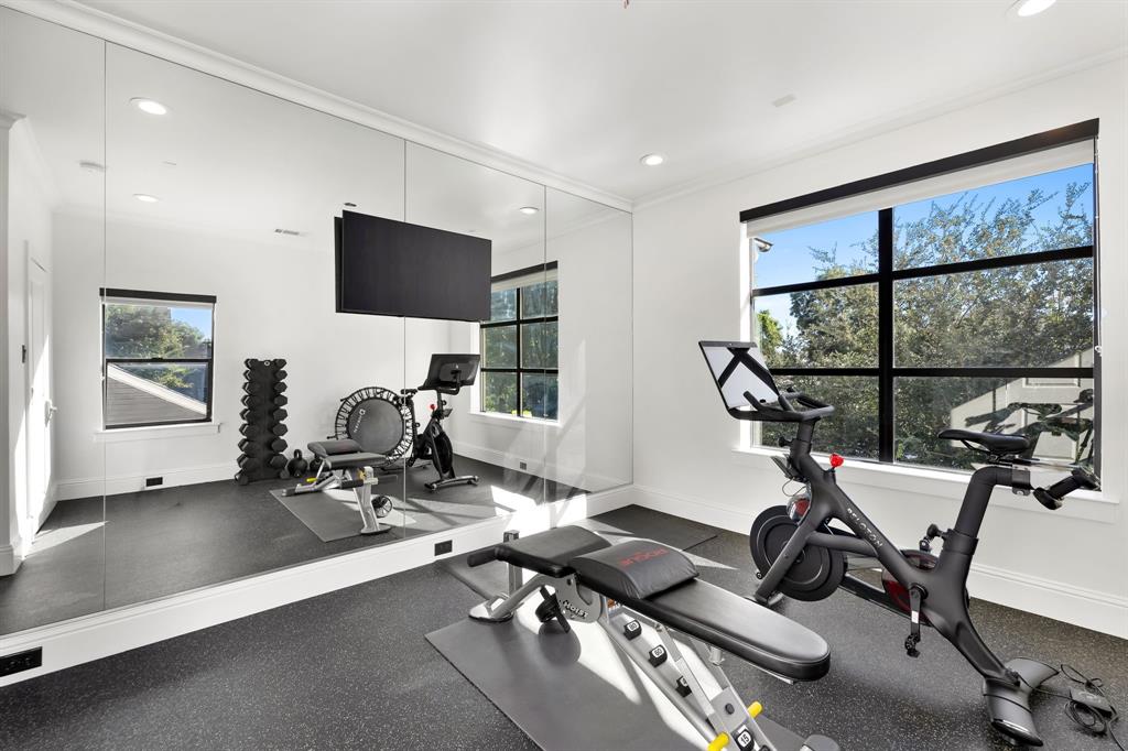 4635 West Amherst Avenue Dallas, TX 75209 - Photo 22 of 36 a view of a room with gym equipment