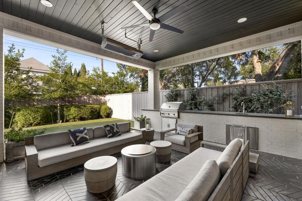 4635 West Amherst Avenue Dallas, TX 75209 - Photo 30 of 36 a living room with patio furniture and a potted plant