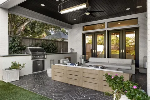 a view of a house with garden and yard