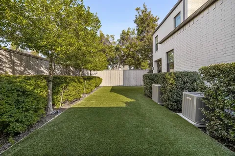 a view of a back yard of the house