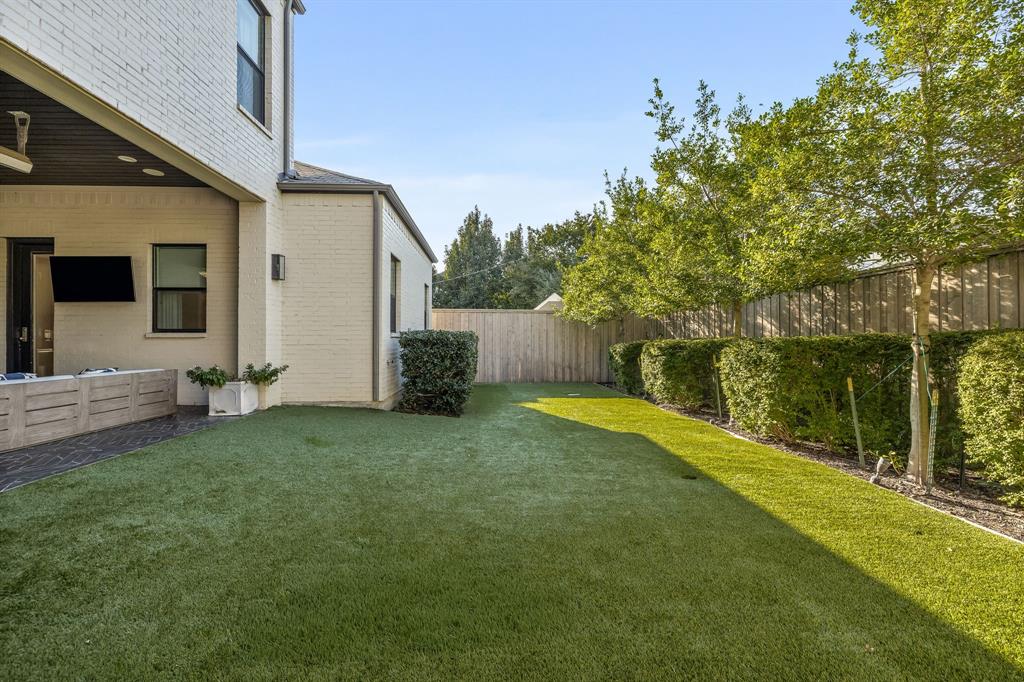 4635 West Amherst Avenue Dallas, TX 75209 - Photo 35 of 36 a view of a house with backyard and sitting area