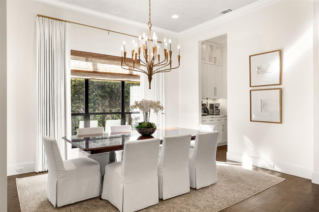 4635 West Amherst Avenue Dallas, TX 75209 - Photo 5 of 36 a living room with furniture and a chandelier