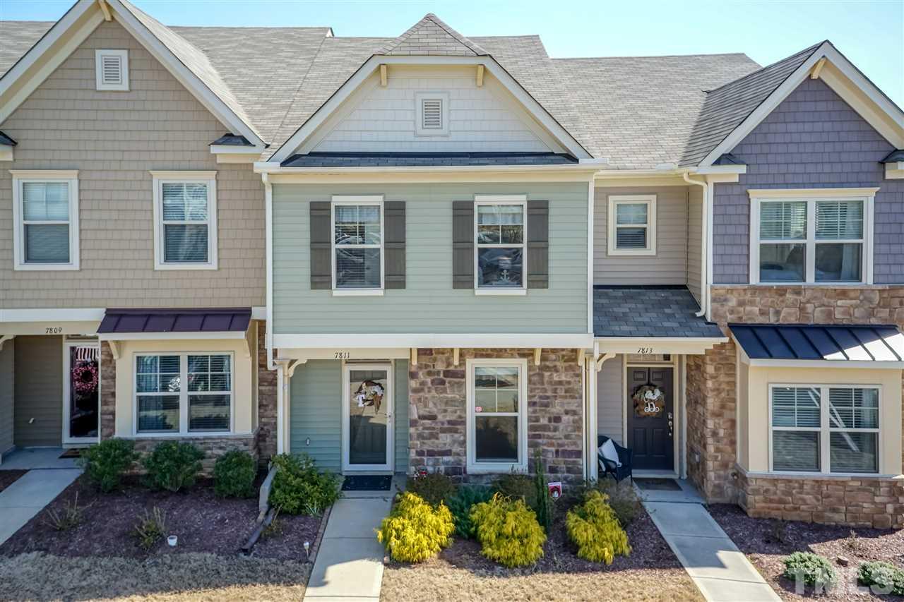 7811 Lillyhurst Drive Raleigh, NC 27612 - Photo 1 of 25 front view of a house with a yard