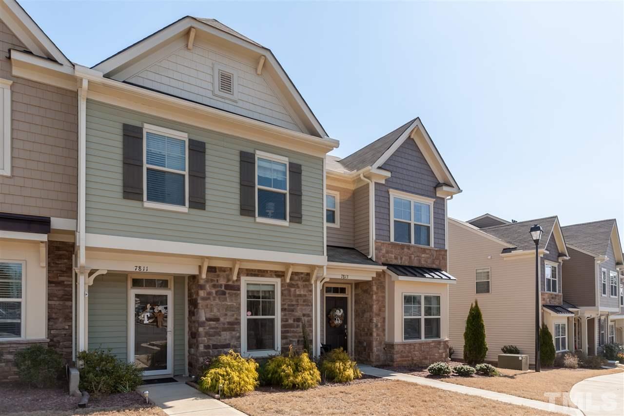7811 Lillyhurst Drive Raleigh, NC 27612 - Photo 2 of 25 a front view of a house with glass windows