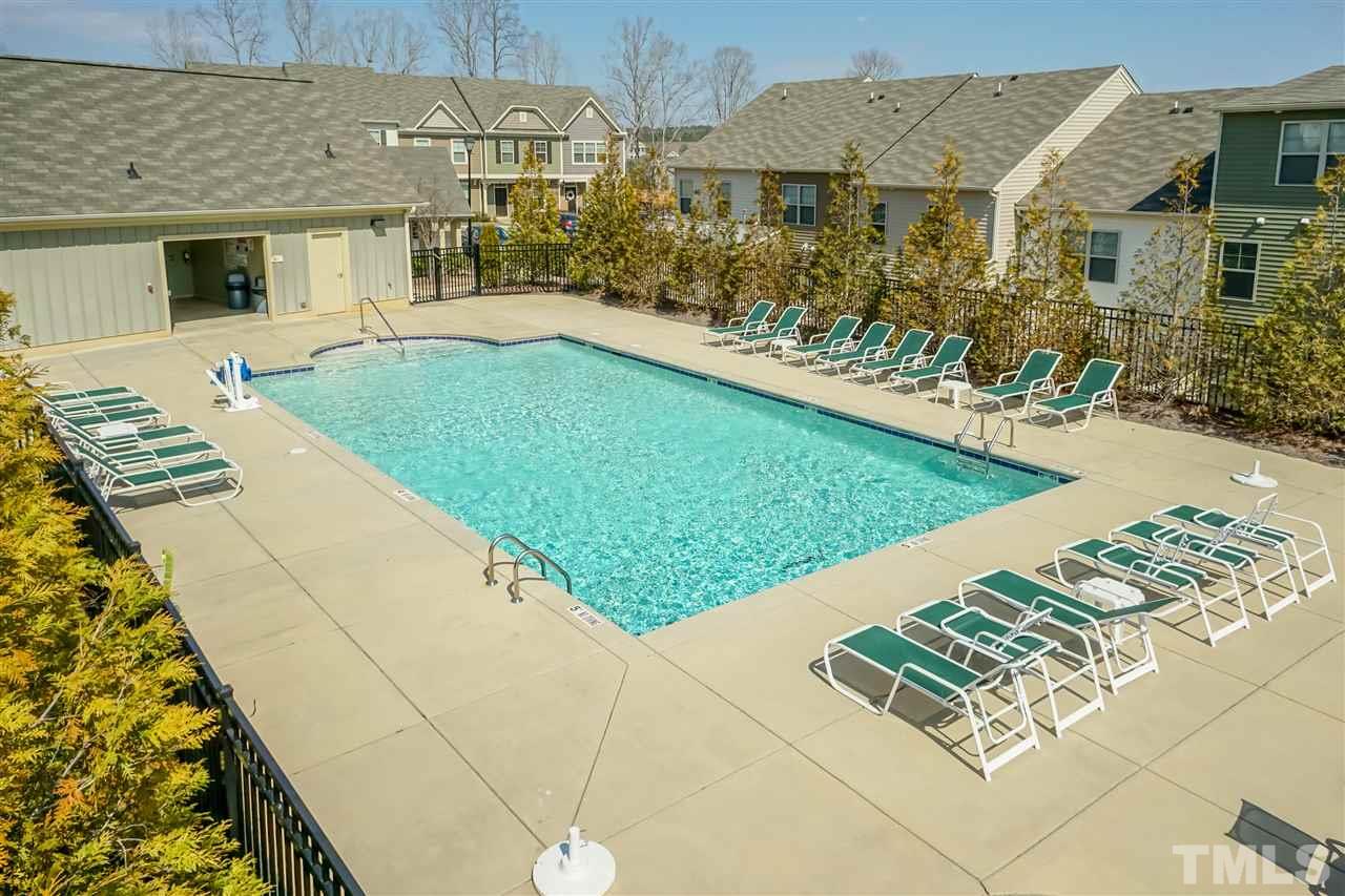 7811 Lillyhurst Drive Raleigh, NC 27612 - Photo 25 of 25 a view of a house with a yard and sitting area