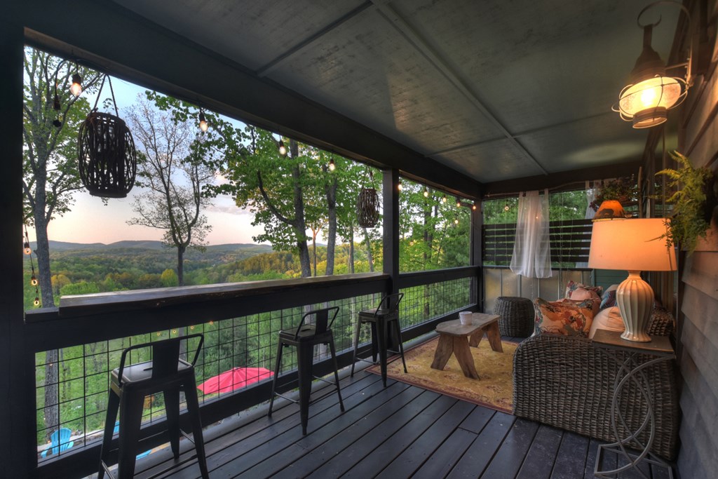 329 Robinson Thomas Road Morganton, GA 30560 - Photo 34 of 96 a balcony with furniture and a swing