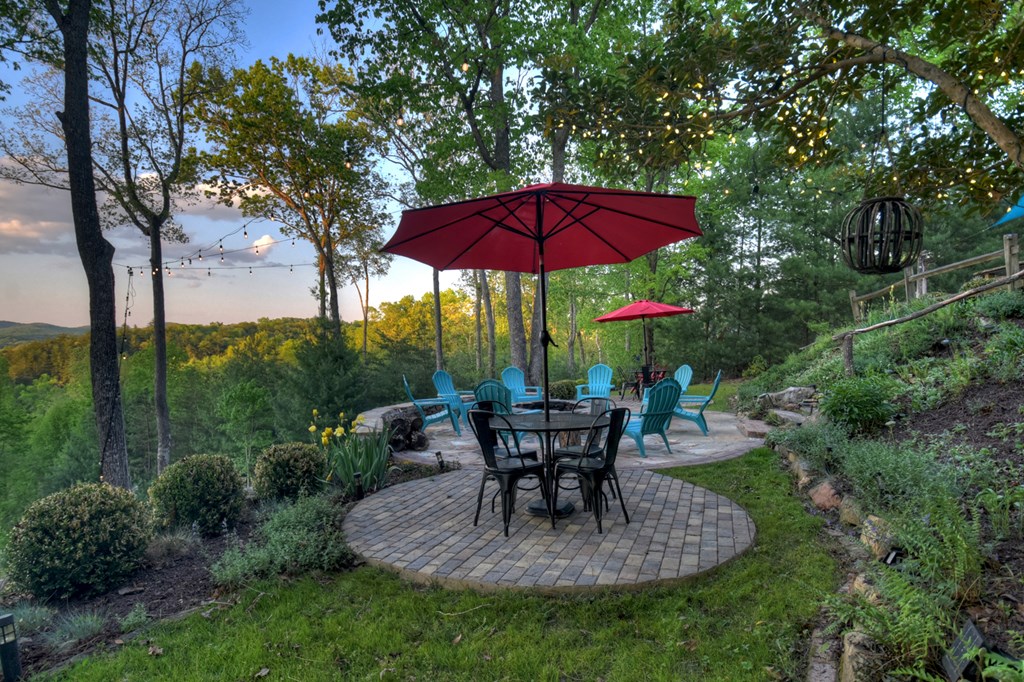 329 Robinson Thomas Road Morganton, GA 30560 - Photo 70 of 96 a view of table and chairs under an umbrella