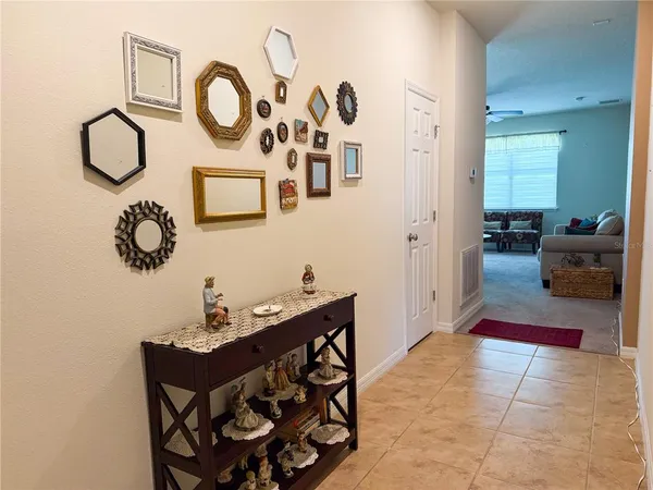 a kitchen with stainless steel appliances granite countertop a refrigerator stove microwave and sink