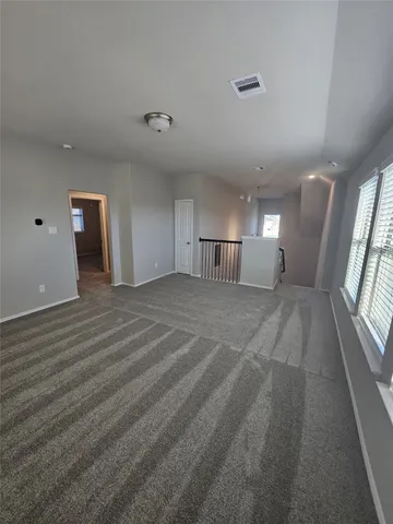 a en suite bathroom with a sink and mirror