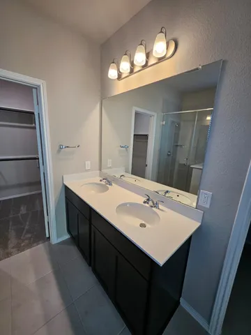 an empty room with a empty space and windows