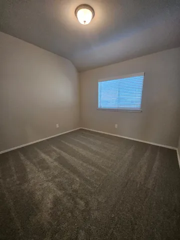 a view of a livingroom with a staircase