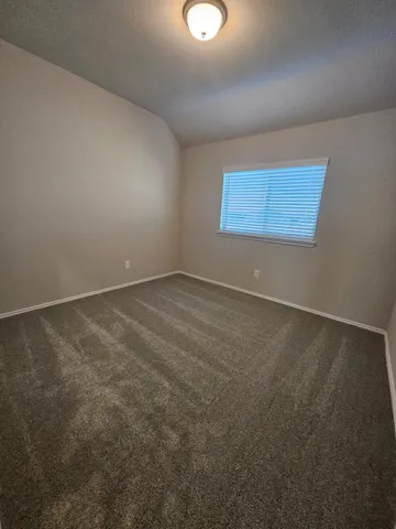a stove top oven sitting inside of a kitchen