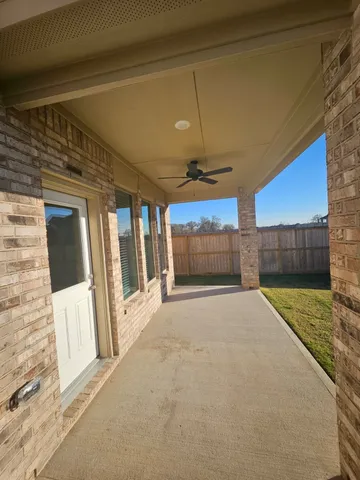 a view of a kitchen with a sink and cabinets