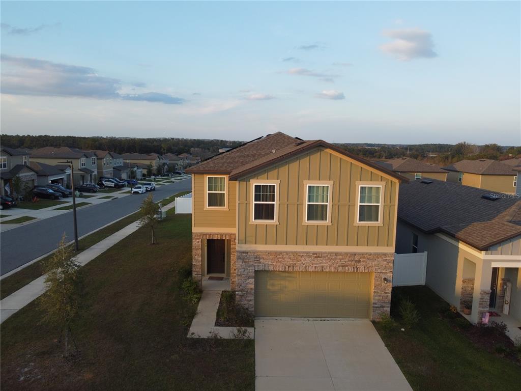8599 Sportsman Loop Groveland, FL 34736 - Photo 1 of 19 a view of a house with a terrace