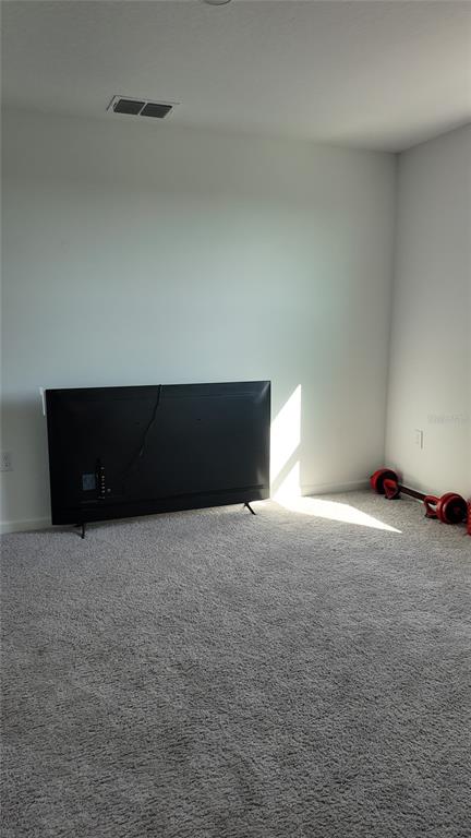 8599 Sportsman Loop Groveland, FL 34736 - Photo 12 of 19 a view of an empty room and window