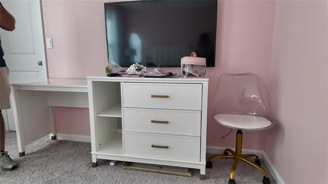 a bathroom with a toilet and a bathtub