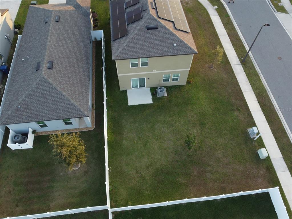 8599 Sportsman Loop Groveland, FL 34736 - Photo 2 of 19 an aerial view of a house