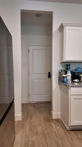 a view of cabinets and window