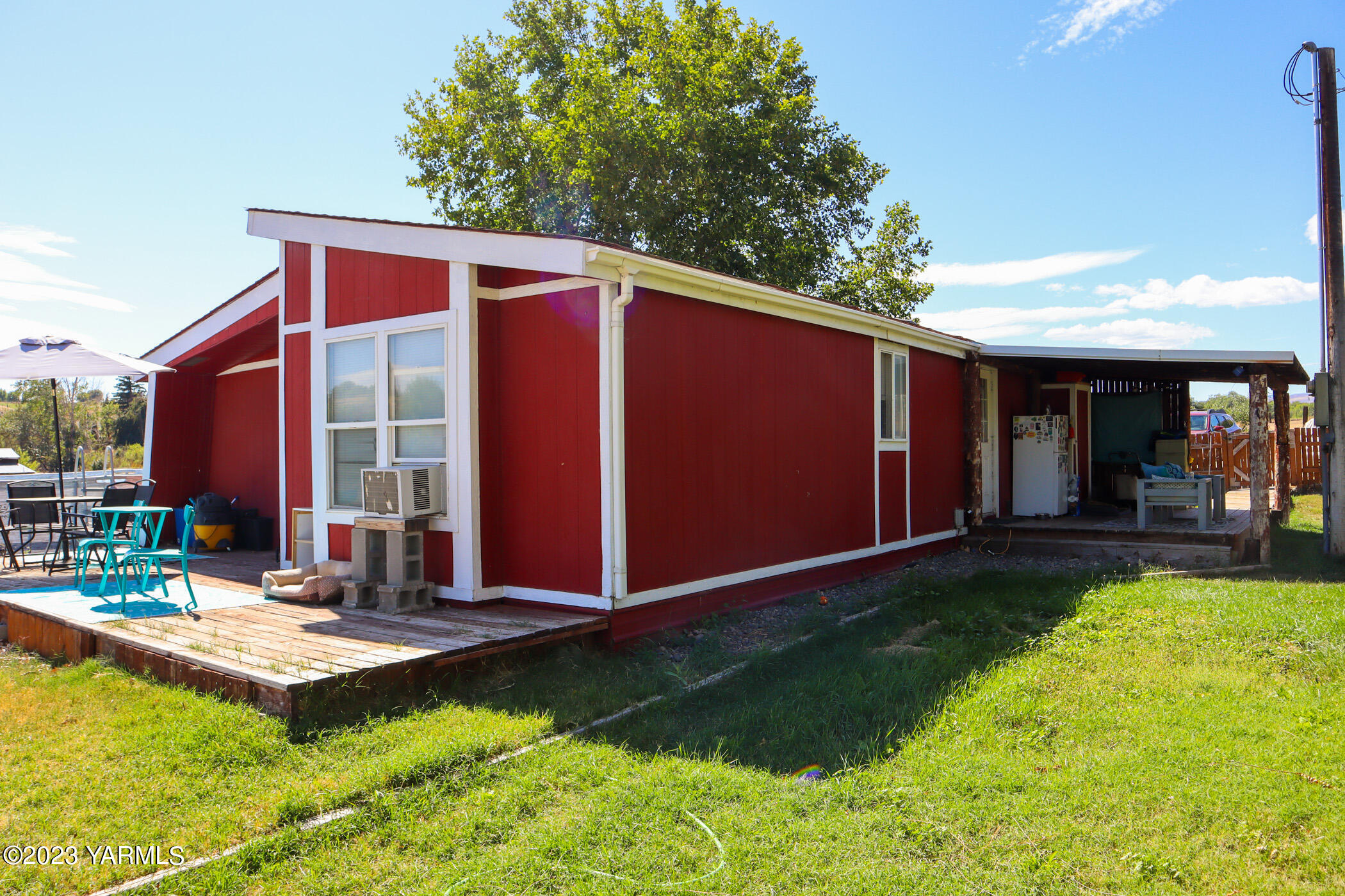 211 Cook Road Yakima, WA 98908 - Photo 1 of 23 a view of a backyard with a patio