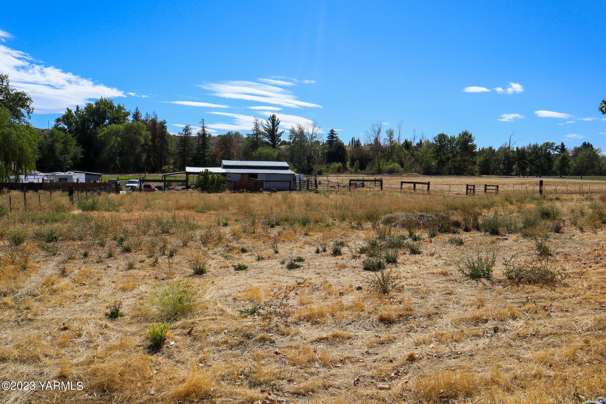 211 Cook Road Yakima, WA 98908 - Photo 19 of 23 a view of a yard with an outdoor space