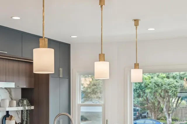 a bedroom with a bed and glass window