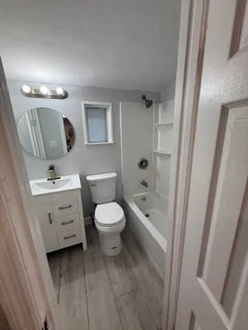 a view of a big room with an ocean view and boat