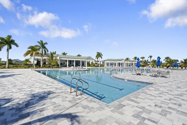 a view of a swimming pool with an ocean view