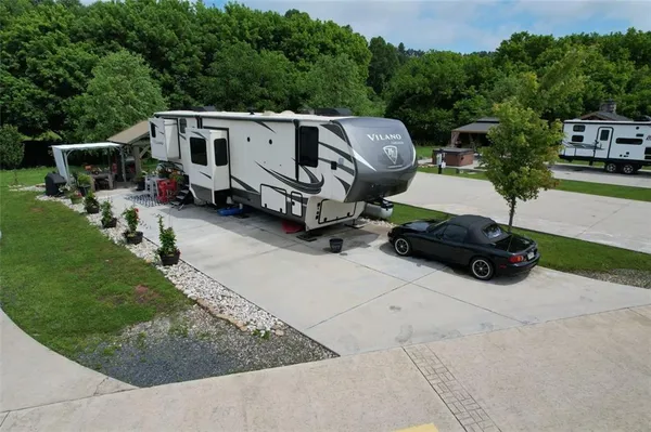 a view of a patio in backyard