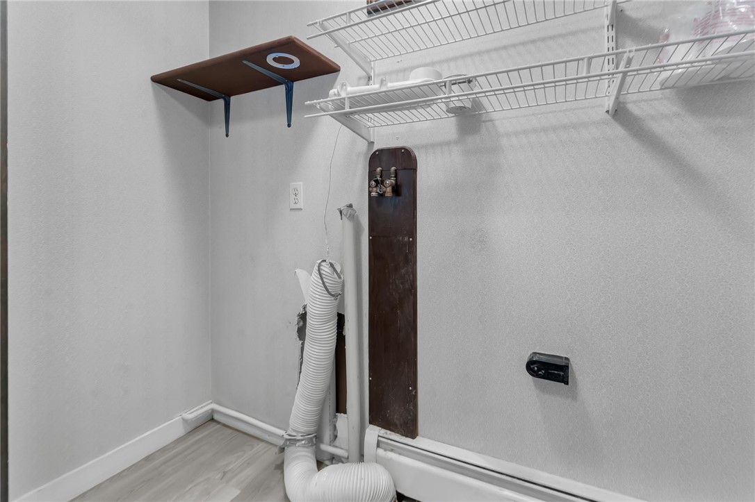 381 Woonsocket Hill Road North Smithfield, RI 02896 - Photo 46 of 46 First Floor Laundry Closet off kitchen