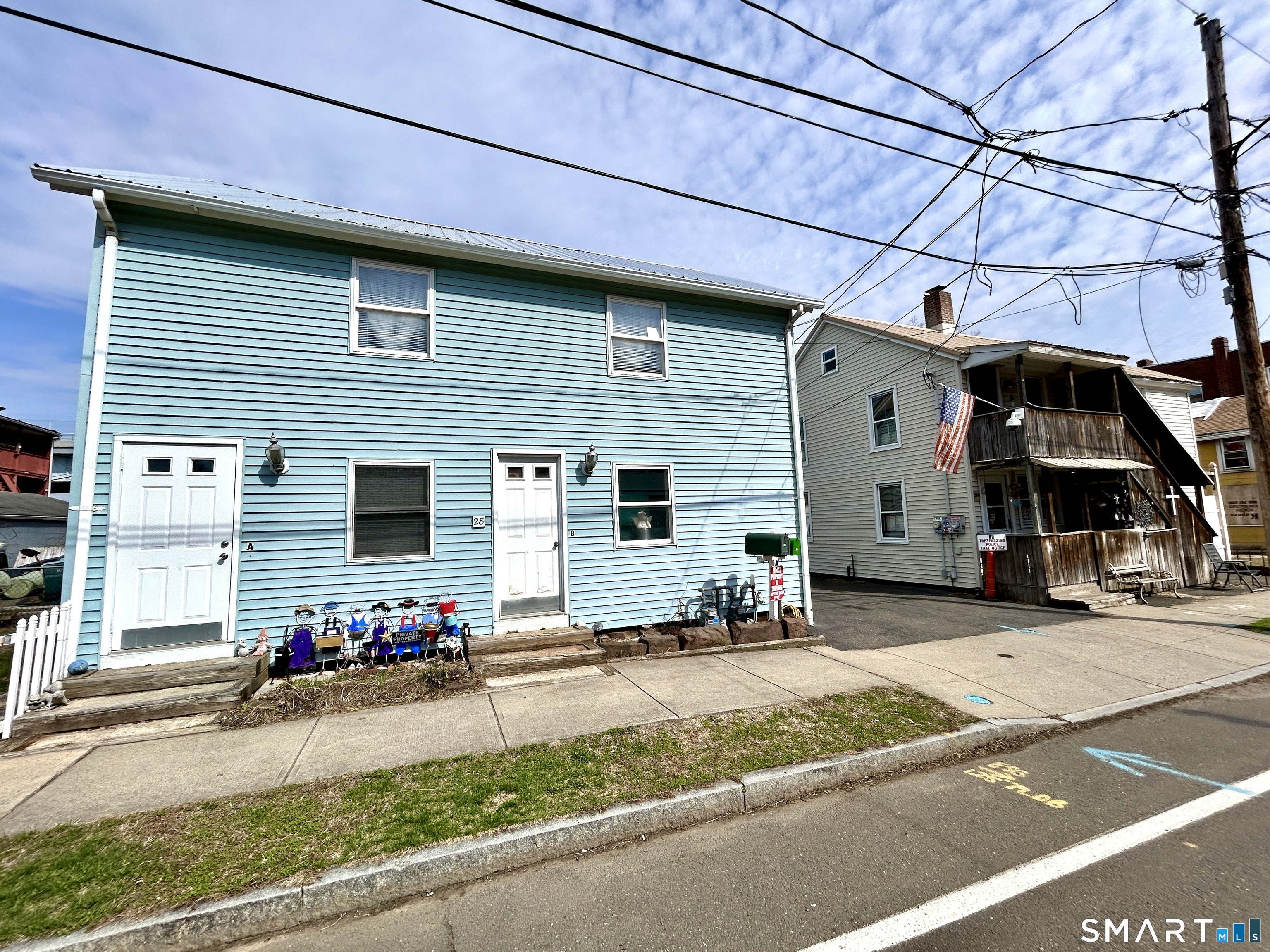 Portland Street Middletown, CT 06457 - Photo 5 of 20 a front view of a house with garage
