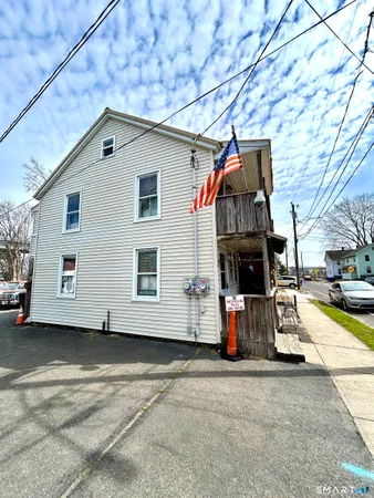 a view of a house with a patio